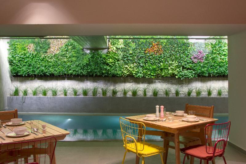 Coco-Mat Athens Jumelle Hotel Exterior photo A living wall in a restaurant