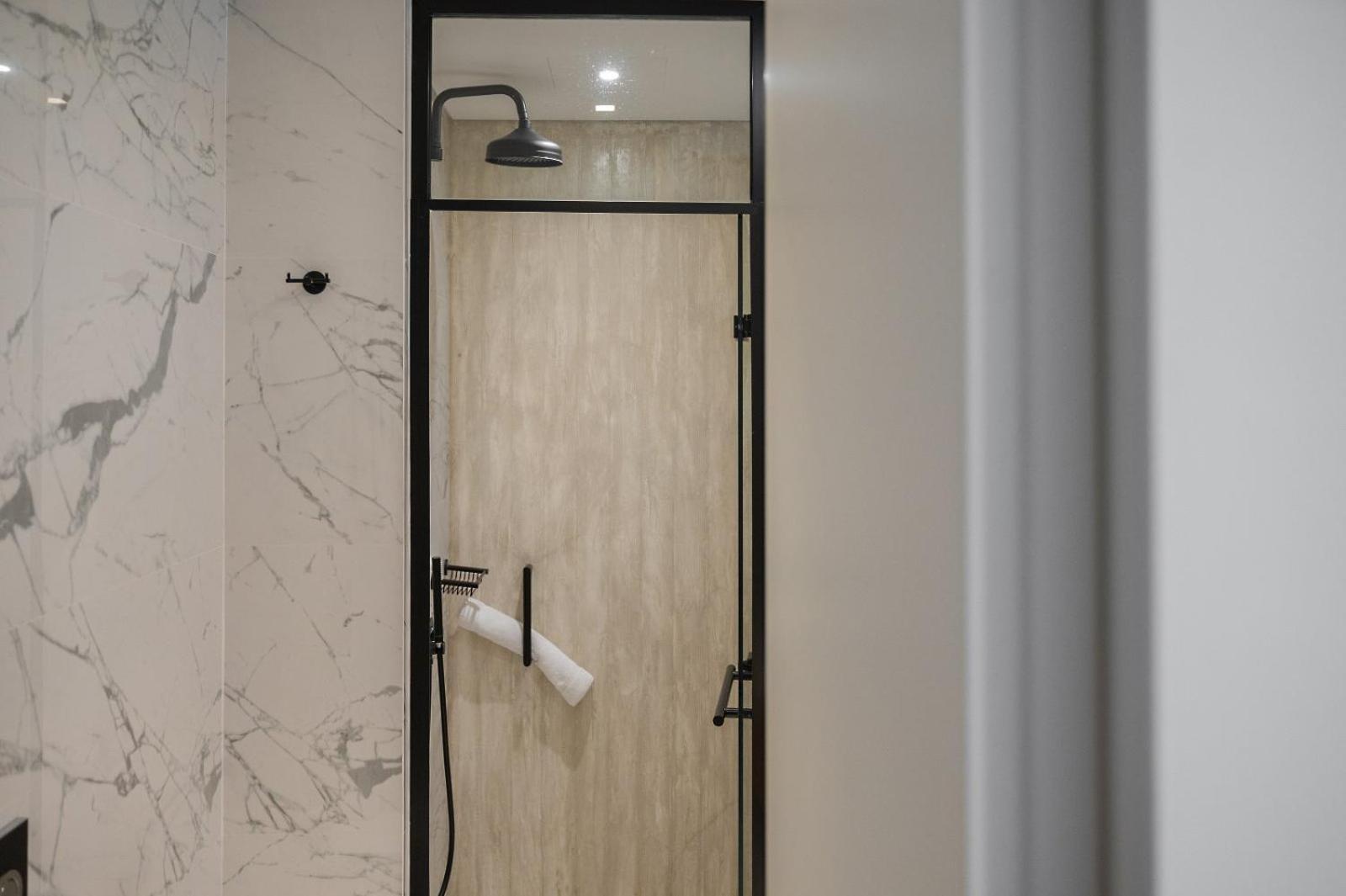 Coco-Mat Athens Jumelle Hotel Exterior photo A shower with a shower head