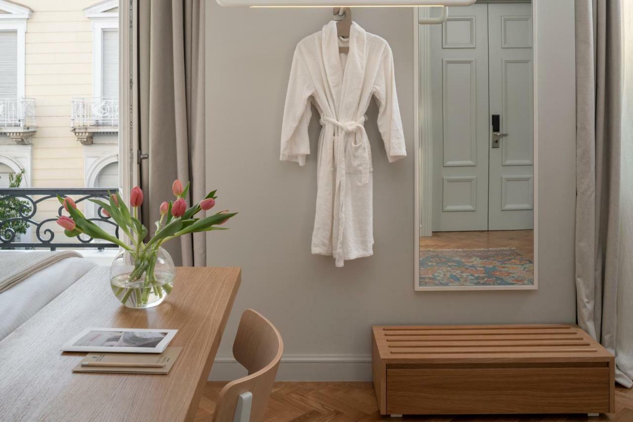 Coco-Mat Athens Jumelle Hotel Exterior photo A bathrobe hanging on a wall